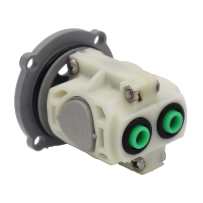 Grey and white plastic cartridge with black rubber o-rings green cup washers and stainless screws.