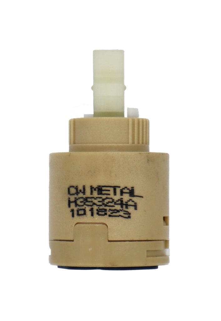Tan plastic cartridge with white square handle connection and black rubber seals with cw metal on side.