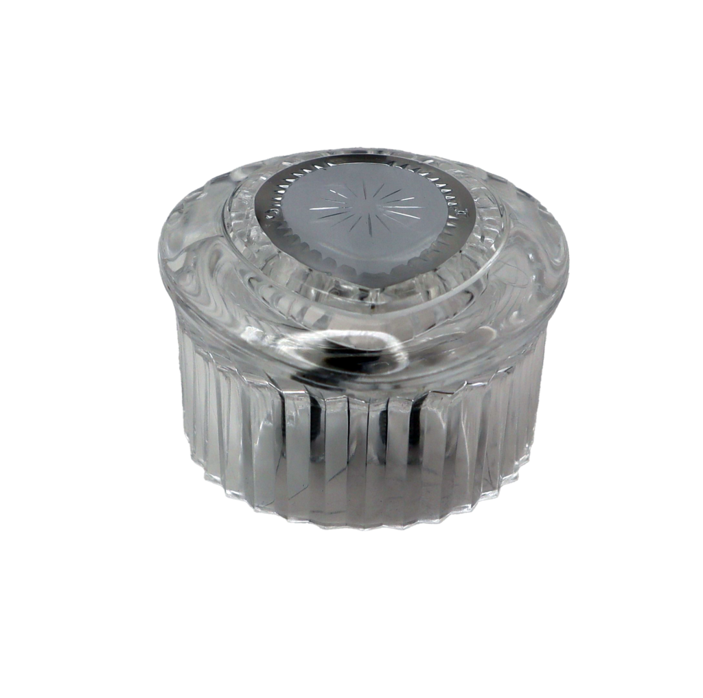 Clear oval acrylic handle with index button.