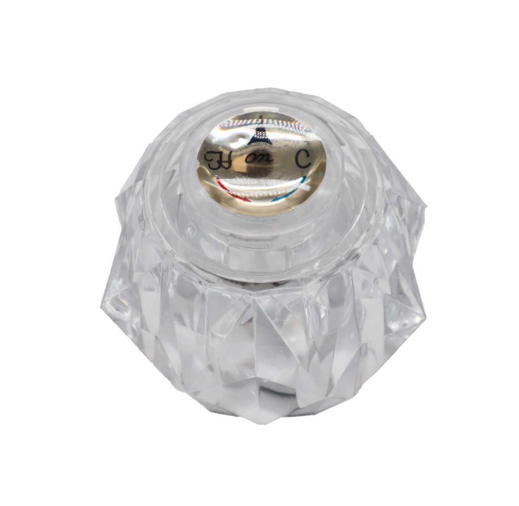 Acrylic round handle with gold index button with red and blue hot and cold markings.