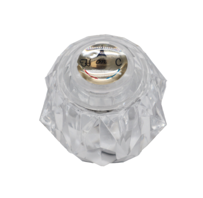 Acrylic round handle with gold index button with red and blue hot and cold markings.