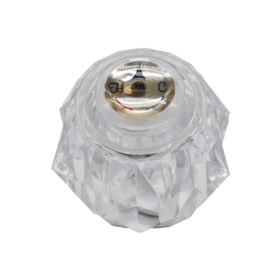 Acrylic round handle with gold index button with red and blue hot and cold markings.
