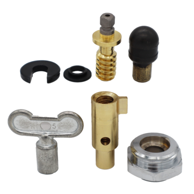 Black rubber washers brass and black rubber plunger bright brass yoke and stem screw with polished chrome nut and metal tee key.