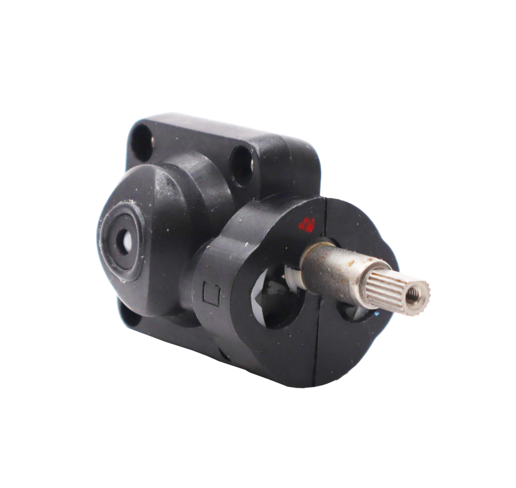 Black plastic cartridge with chrome stem handle connection with red marking for proper installation.