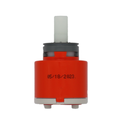 Bright orange plastic cartridge with grey limit stop white square handle connection white bottom with red seal.