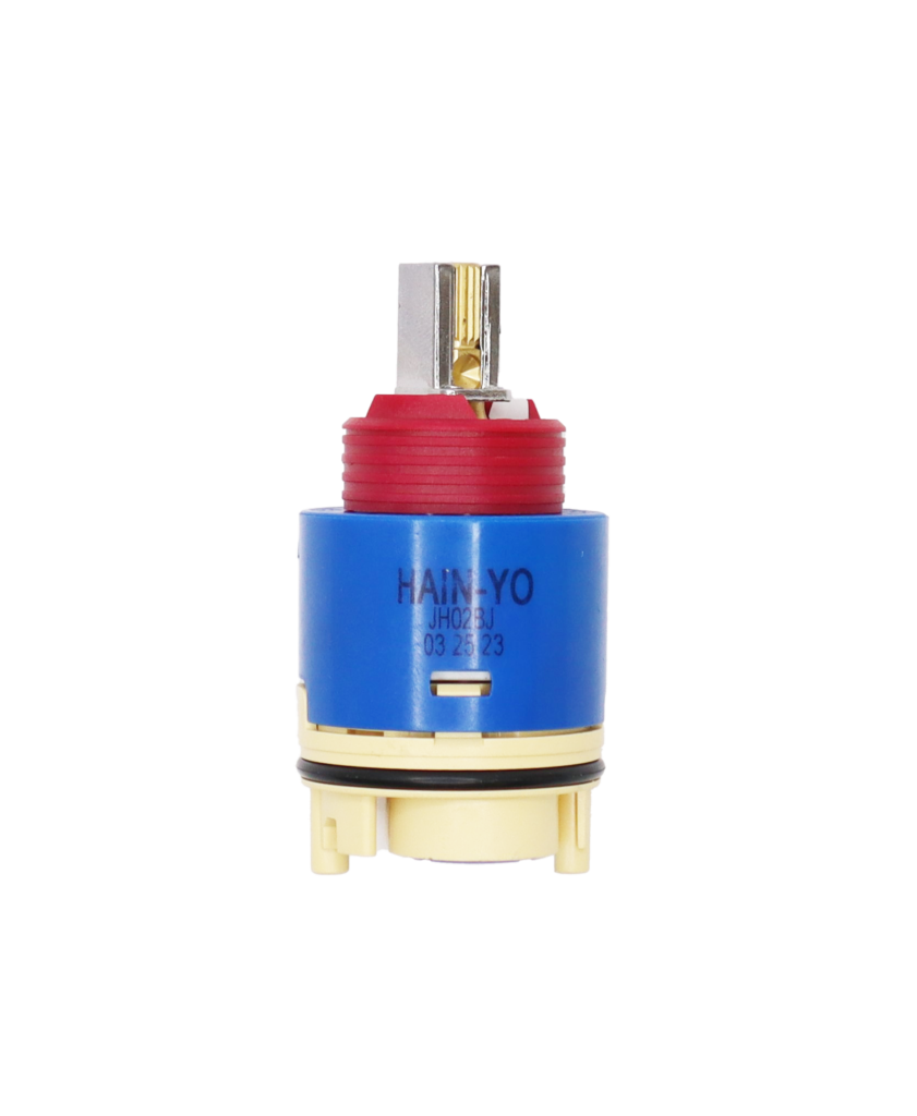 Blue and tan plastic cartridge with red limit stop square handle connection with blakc seals.