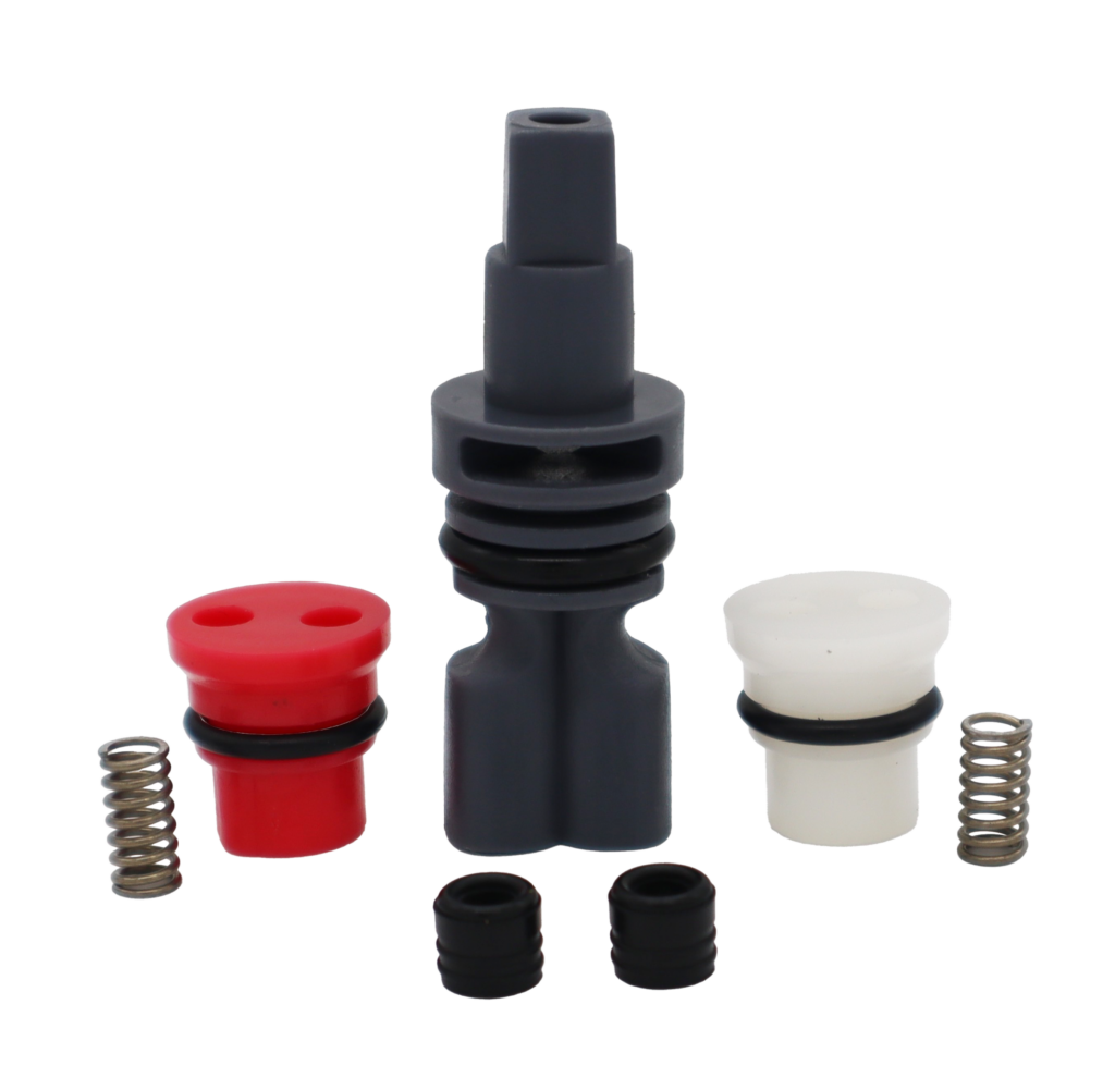 Grey plastic cartridge with red and white plastic seats stainless springs and black rubber o-rings and washers.
