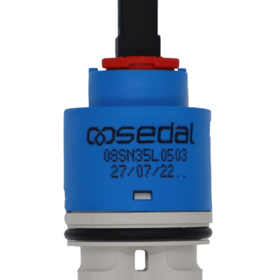 Bright blue cartridge with red limit stop black square handle connection grey bottom with black rubber o-ring and seals.