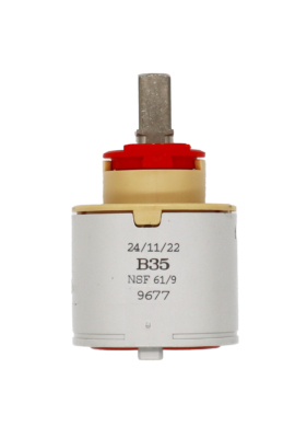Grey plastic cartridge with tan top red limit stop square metal handle connection with red rubber seals.