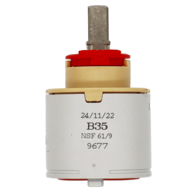 Grey plastic cartridge with tan top red limit stop square metal handle connection with red rubber seals.