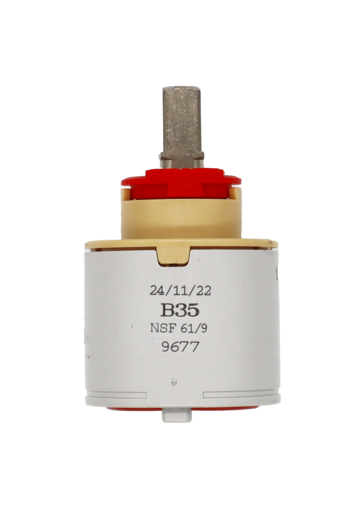 Grey plastic cartridge with tan top red limit stop square metal handle connection with red rubber seals.
