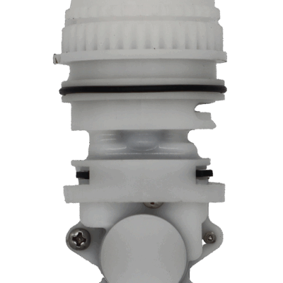 White plastic cartridge with brass stem and black oring and washers.
