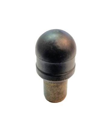 Brass body & black rubber bulb plunger.