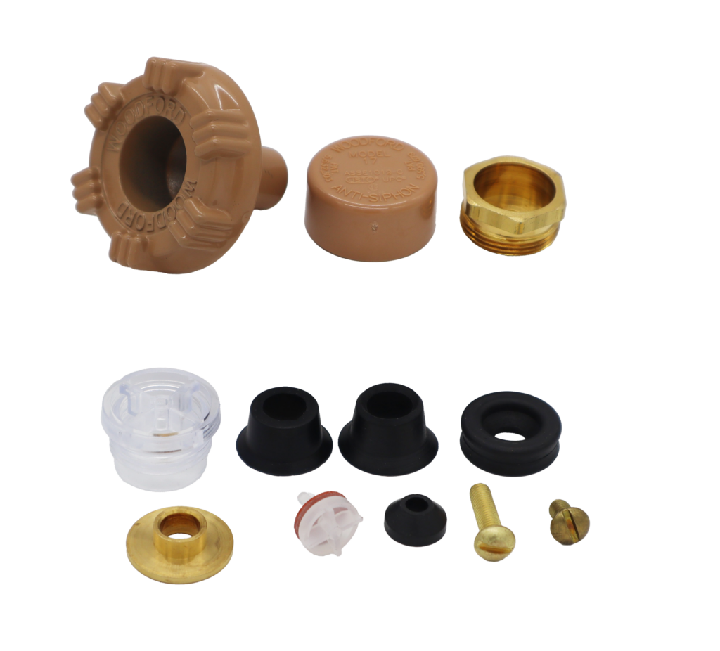 Light brown handle and cap bright brass nut washer and screws black rubber washers and plastic vacuum breaker.