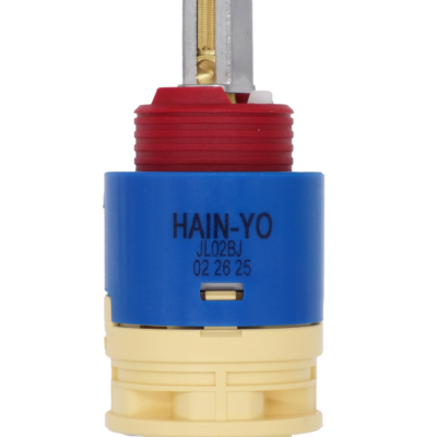 Bright blue plastic cartridge with red limit stop brass stem and metal handle adapter with tan bottom and blue seal.