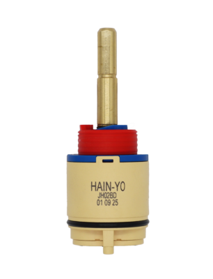 Tan and blue plastic cartridge with red limit stop brass stem and black rubber seals.