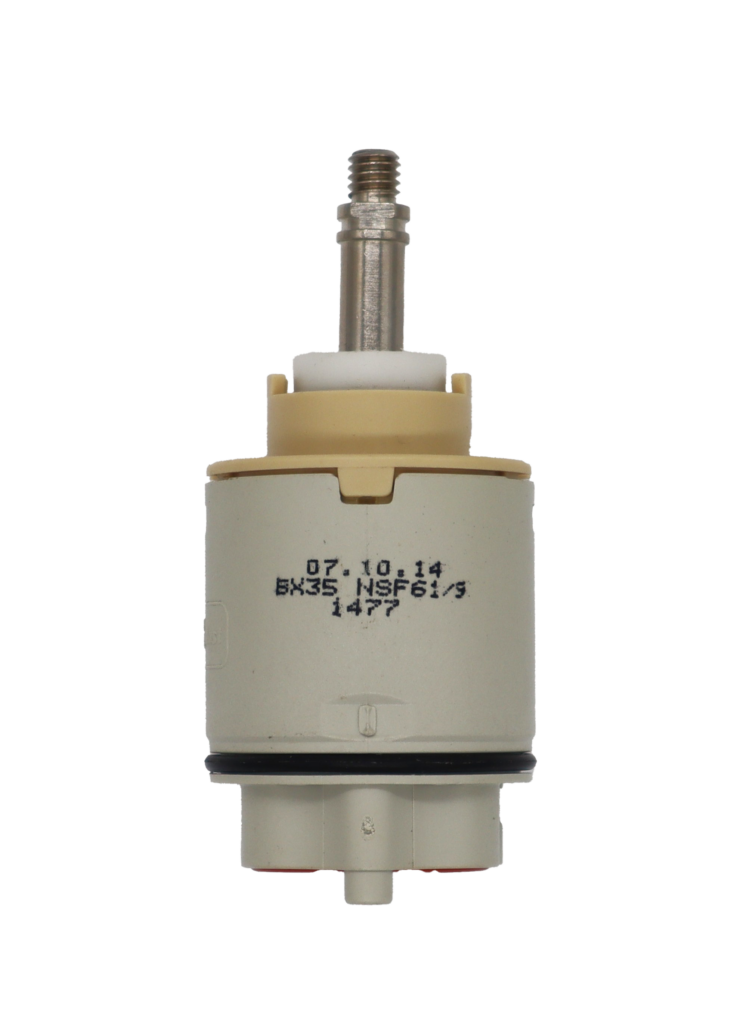 Grey and tan plastic cartridge with white limit stop metal screw type handle connection black rubber o-ring with red rubber bottom seals.