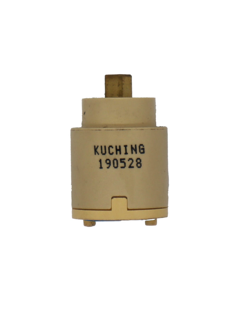 Tan plastic cartridge with square brass handle connection blue rubber bottom seals and kuching stamped on side.