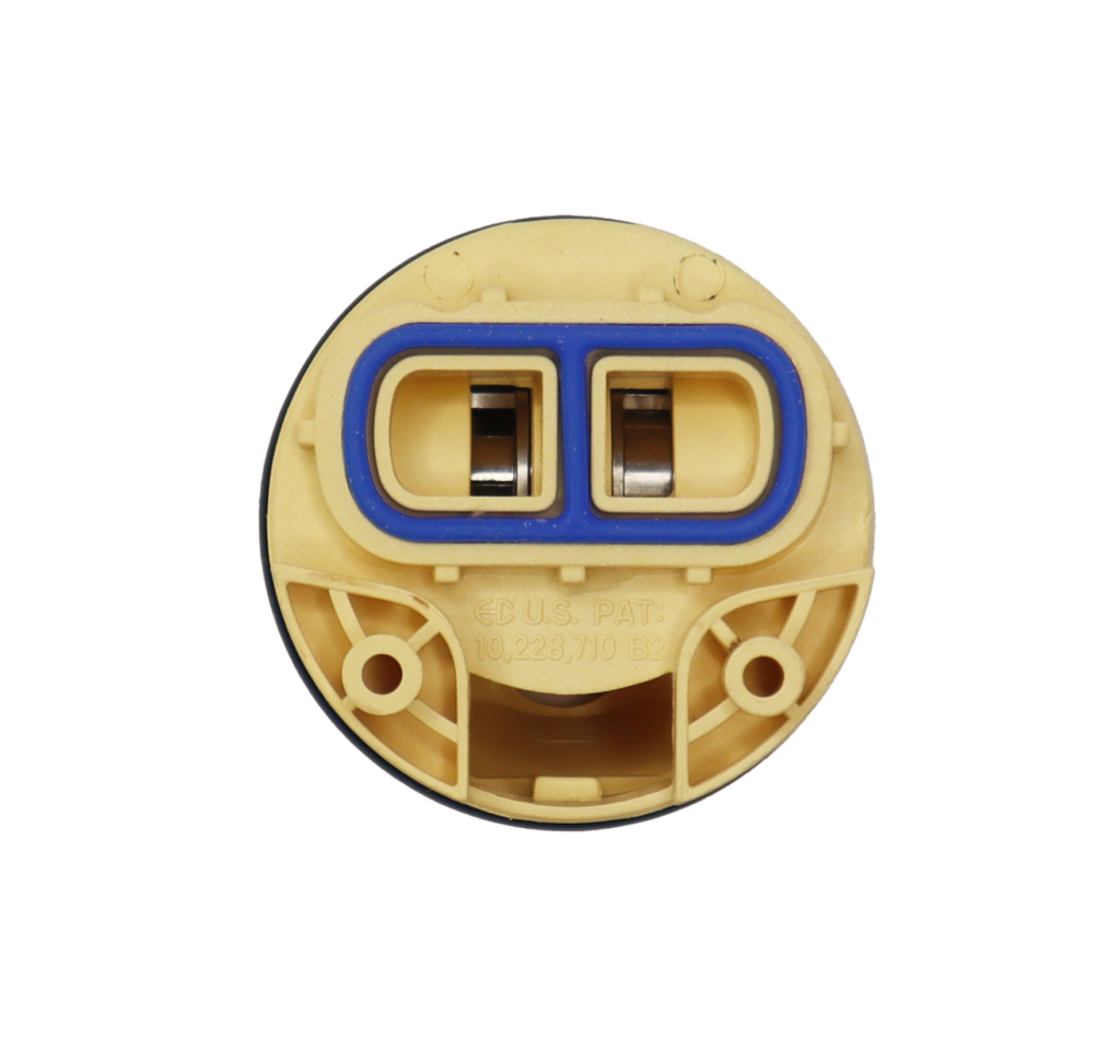 Tan plastic balancer with black rubber o-ring and blue rubber seal.