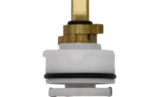 White plastic cartridge with bright brass handle connection with black o-ring and stainless slotted bottom.