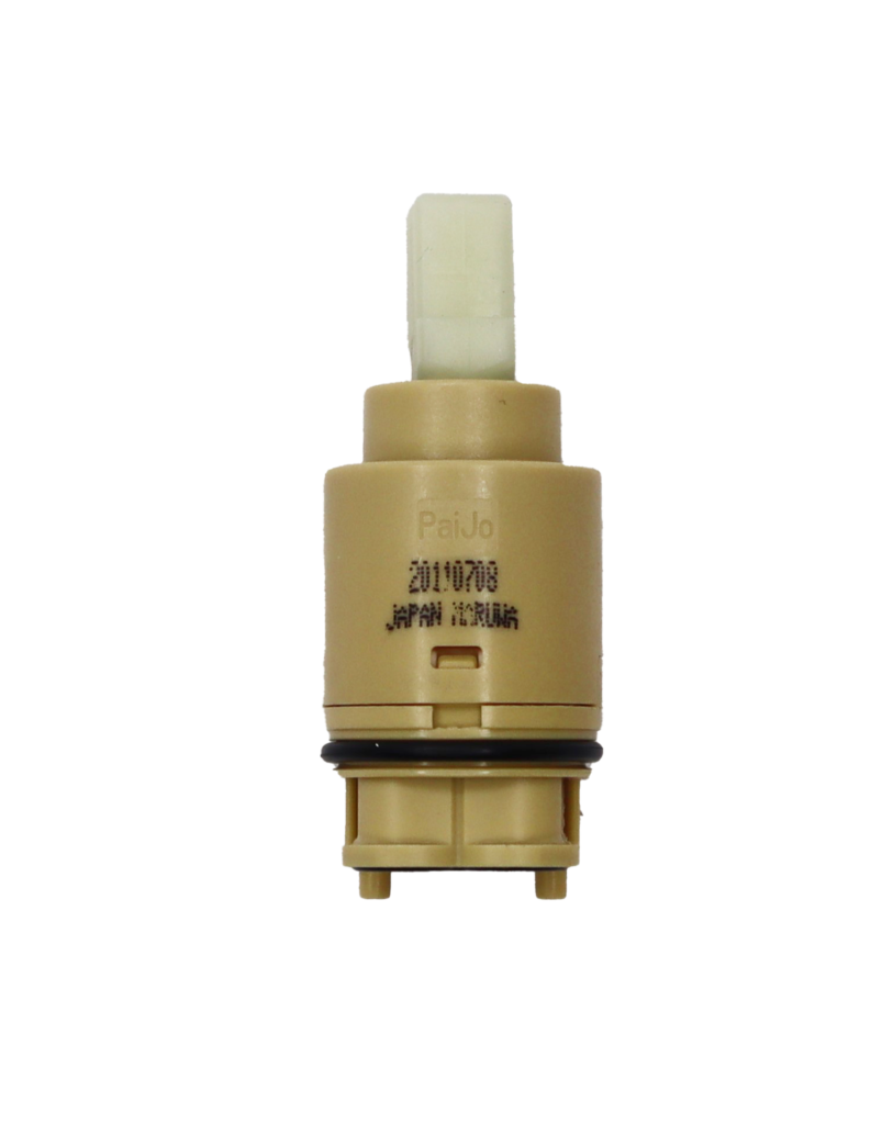Tan plastic cartridge with white square plastic handle connection black oring and bottom washers.