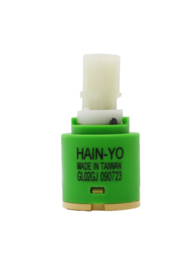 Bright green plastic cartridge with white square handle connection with tan bottom and black rubber seal.