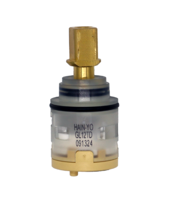 Clear plastic cartridge body with square brass handle connection tan bottom with black orings and seals.