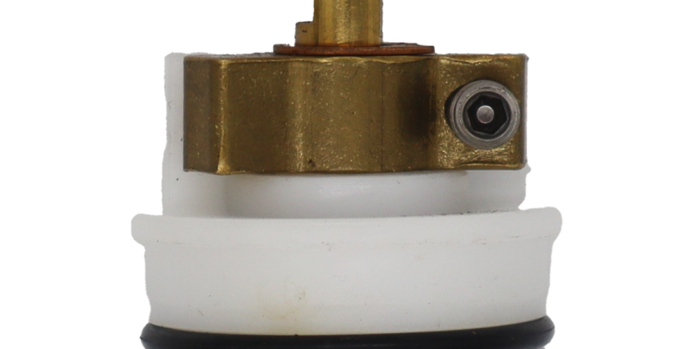 White plastic carttridge with brass limit stop brass stem black rubber o-ring and stainless bottom.