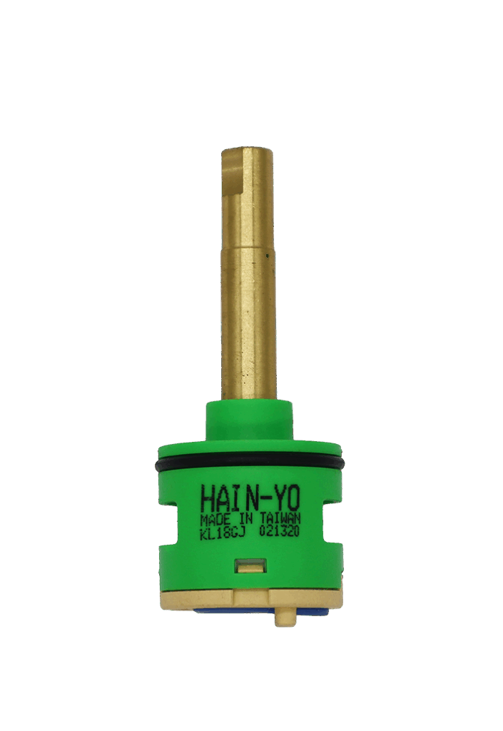 Bright green cartridge with brass stem tan bottom with blue seal and black oring.