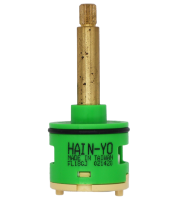 Lime green and tan cartridge with brass stem black rubber o-ring and blue rubber seals.
