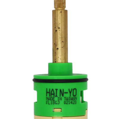 Lime green and tan cartridge with brass stem black rubber o-ring and blue rubber seals.