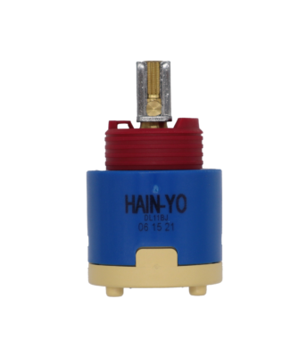 Blue and tan plastic cartridge with red limit stop brass and metal handle connection with blue rubber seal.