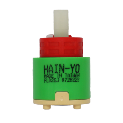 Bright lime green plastic cartridge with red plastic limit stop white square plastic handle connection tan bottom with black seal.