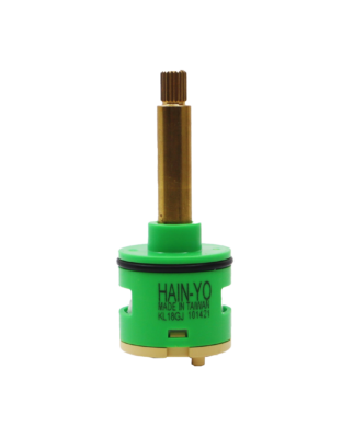 Lime green and tan cartridge with brass stem black rubber o-ring and blue rubber seal.