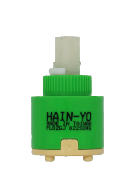 Green plactic cartridge with white square handle connection tan bottom with black seals.