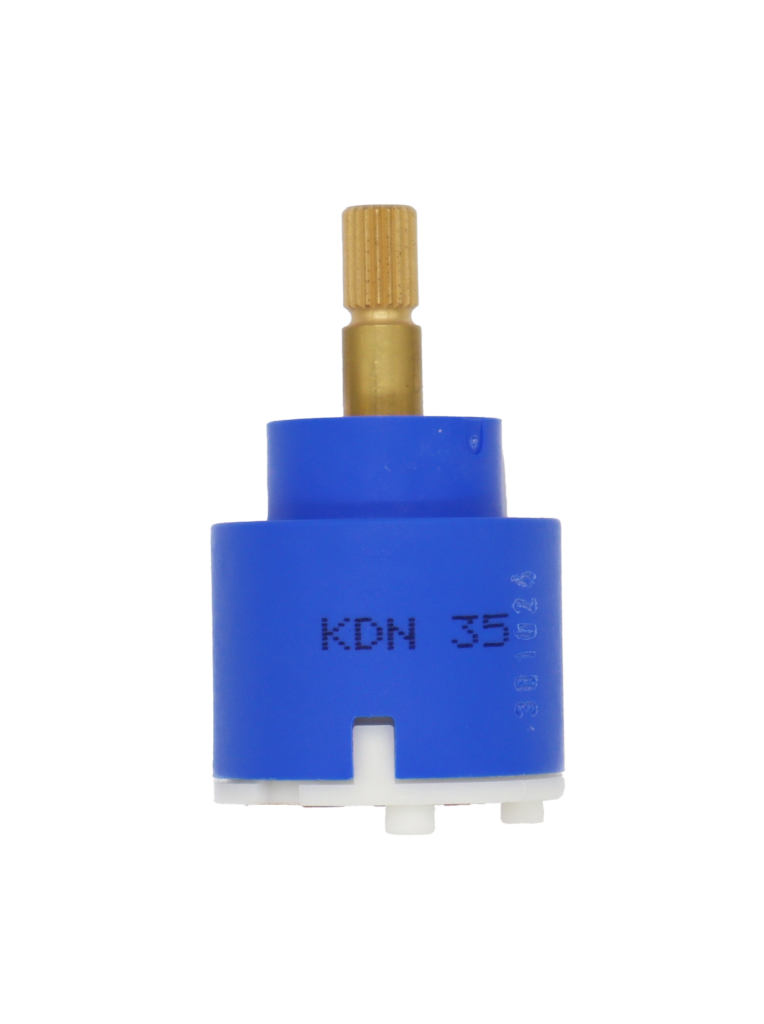 Blue and white plastic cartridge with brass handle connection red rubber seals and 2 alignment pegs.