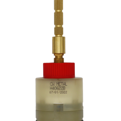 Clear plastic cartridge with red limit stop brass stem and handle extension black rubber o-ring and blue rubber bottom seal.