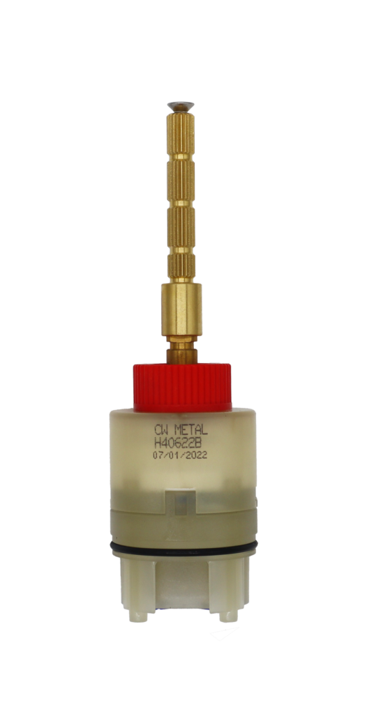 Clear plastic cartridge with red limit stop brass stem and handle extension black rubber o-ring and blue rubber bottom seal.