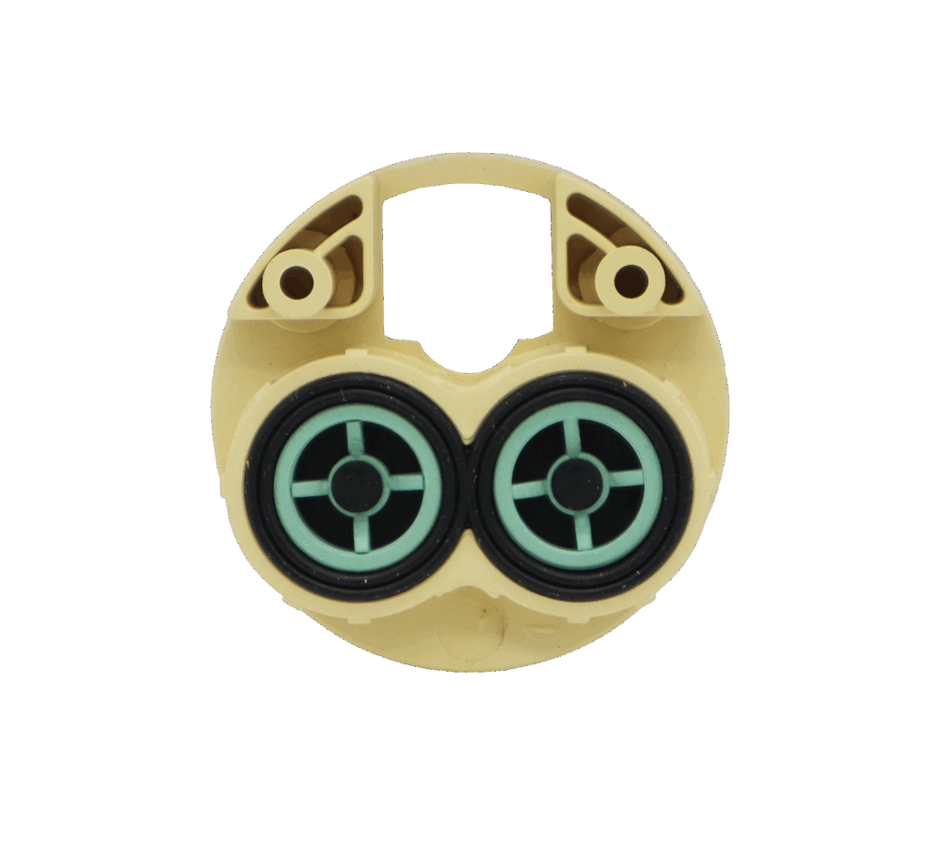 Tan plastic balancer with black and blue seals.