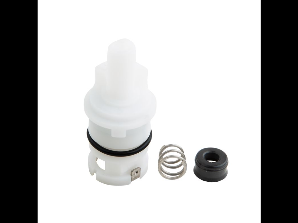White plastic cartridge with black rubber washer and o-ring and stainless spring and bottom.