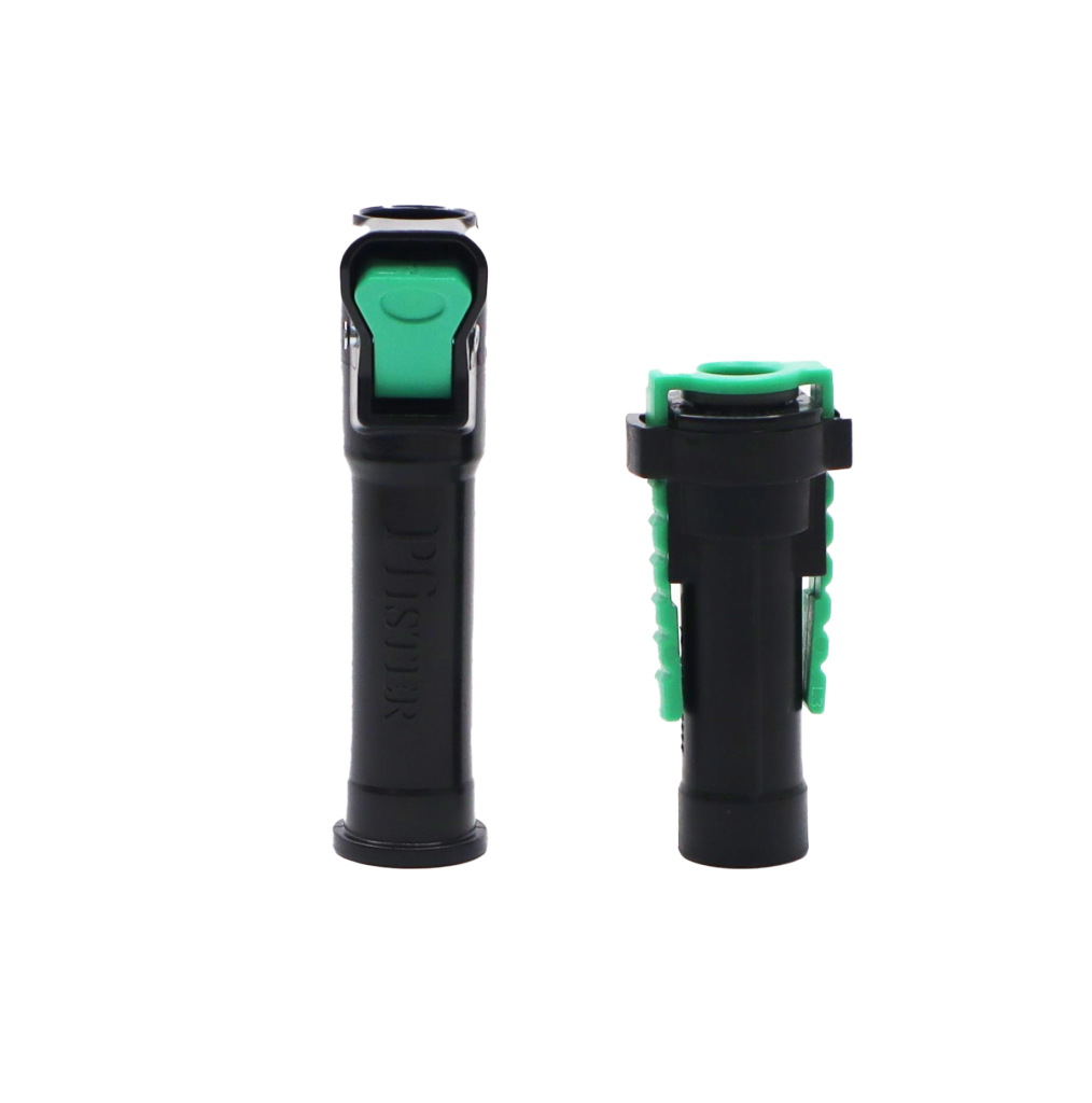 Black plastic quick connect fittings with green release clips.