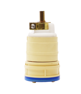 Tan plastic cartridge with white plastic top with brass stem and blue rubber seal.