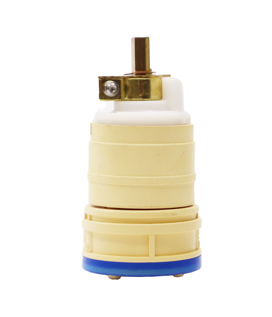 Tan plastic cartridge with white plastic top with brass stem and blue rubber seal.