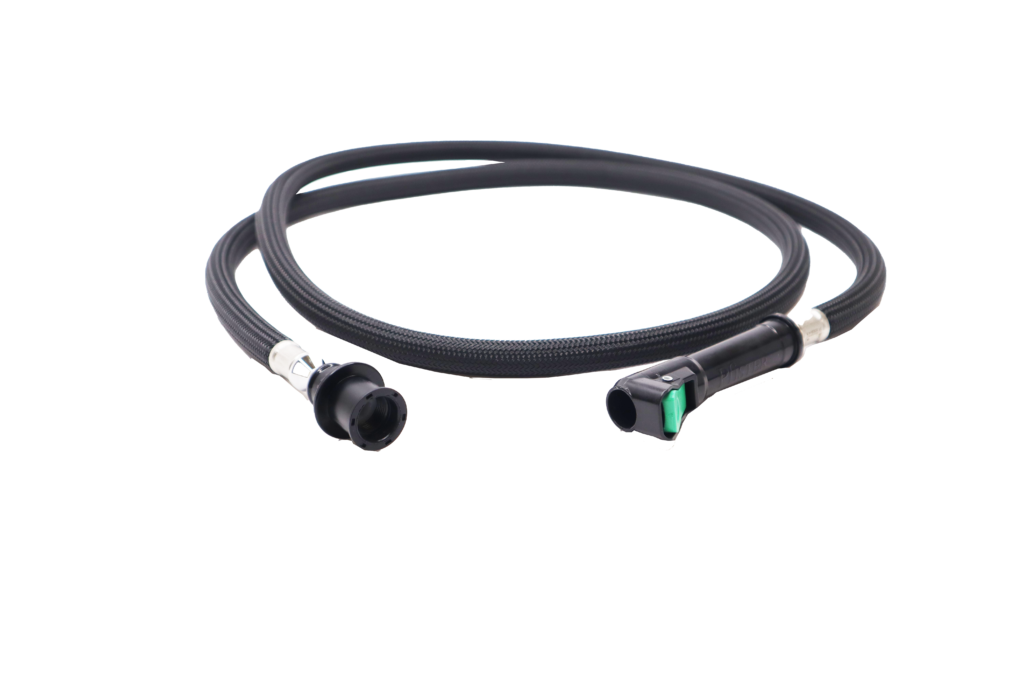 Braided nylon hose with black plastic spray head connection and black and green quick connection.