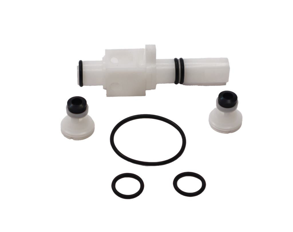 White platic cartridge with black rubber o-rings.