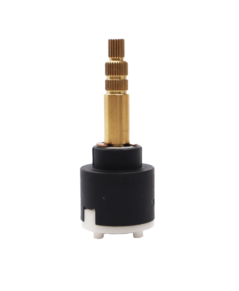 Black plastic cartridge with bright brass stem white bottom with grey seals.