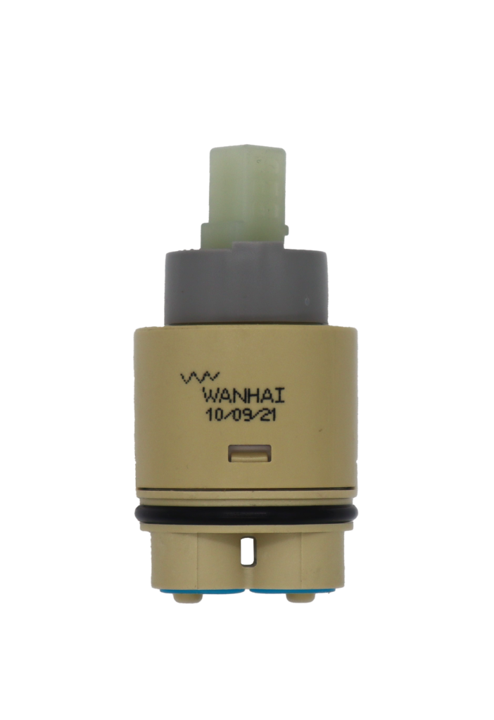 Tan plastic cartridge with grey limit stop square handle connection black oring with light blue bottom seal.