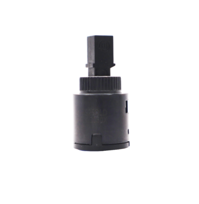 Black plastic cartridge with blue rubber seal.