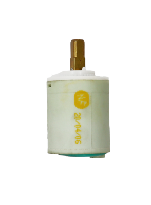 Light grey plastic cartridge with white handle stop brass handle connection and green rubber seal.