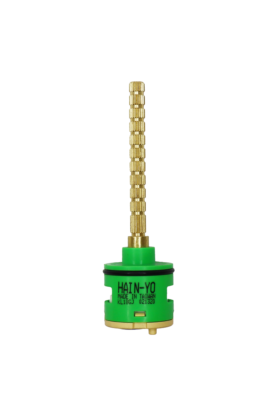 Bright brass stem with green plastic body tan bottom with blue seal.